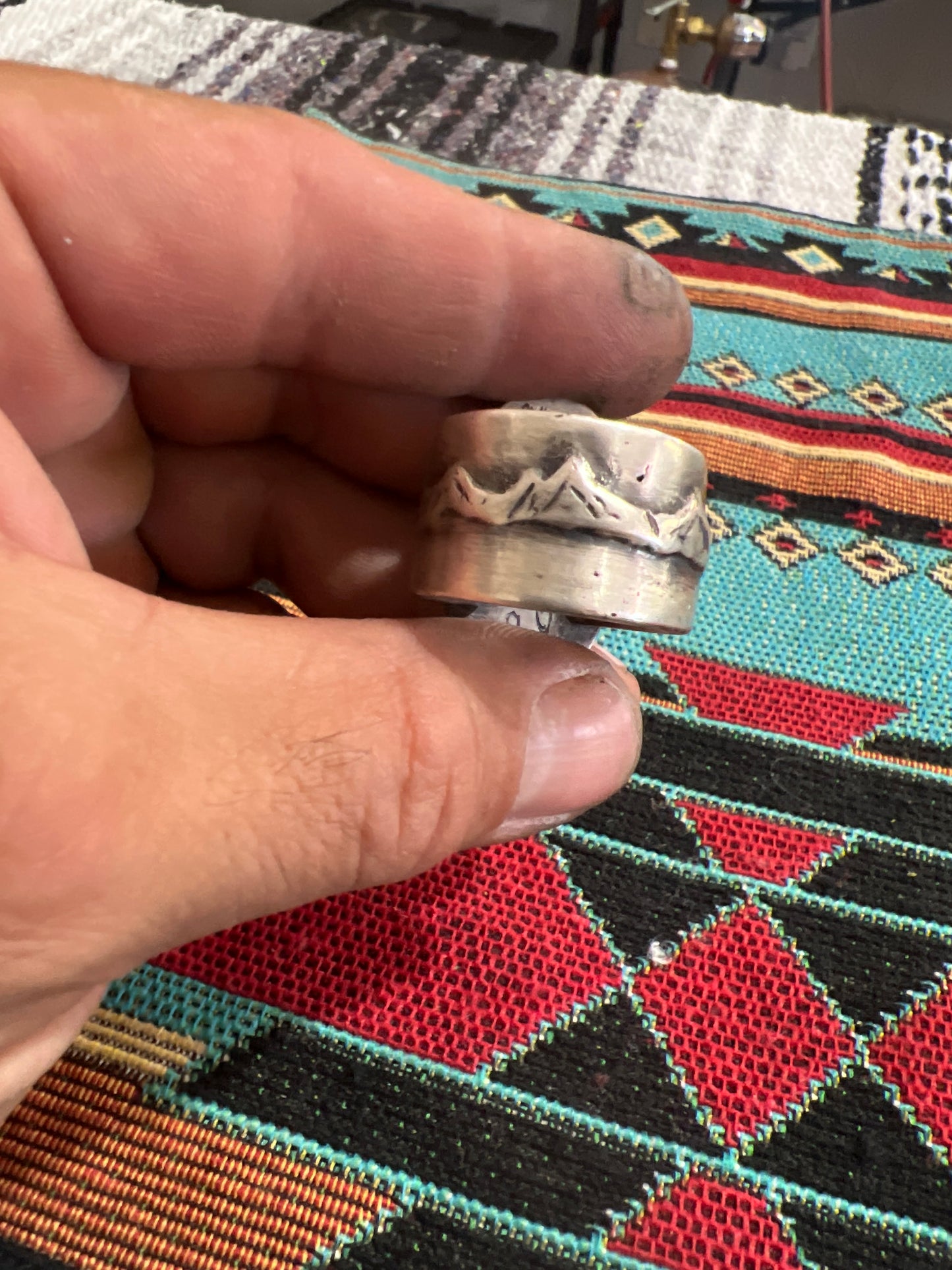 Handmade sterling silver and Tyrone turquoise casted ring.  size 10.