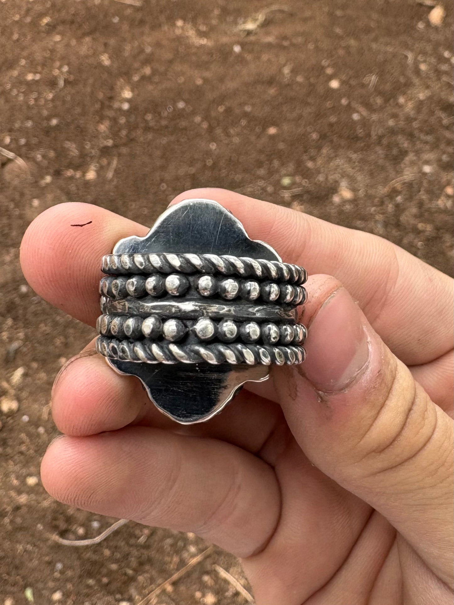 Hand made sterling silver and Tyrone turquoise ring size 10.5