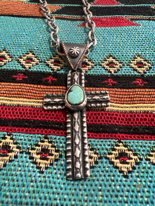 Sterling silver and Tyrone turquoise cross. (chain sold separately)