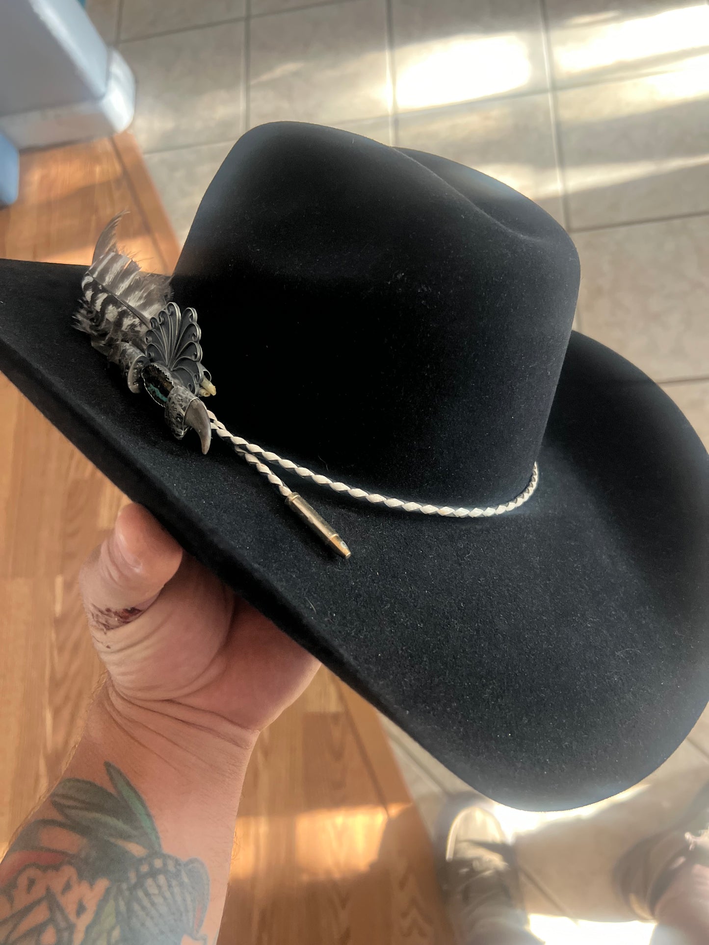 Handmade sterling silver, blackjack turquoise, black bear claw and turkey feather, adjustable hat band