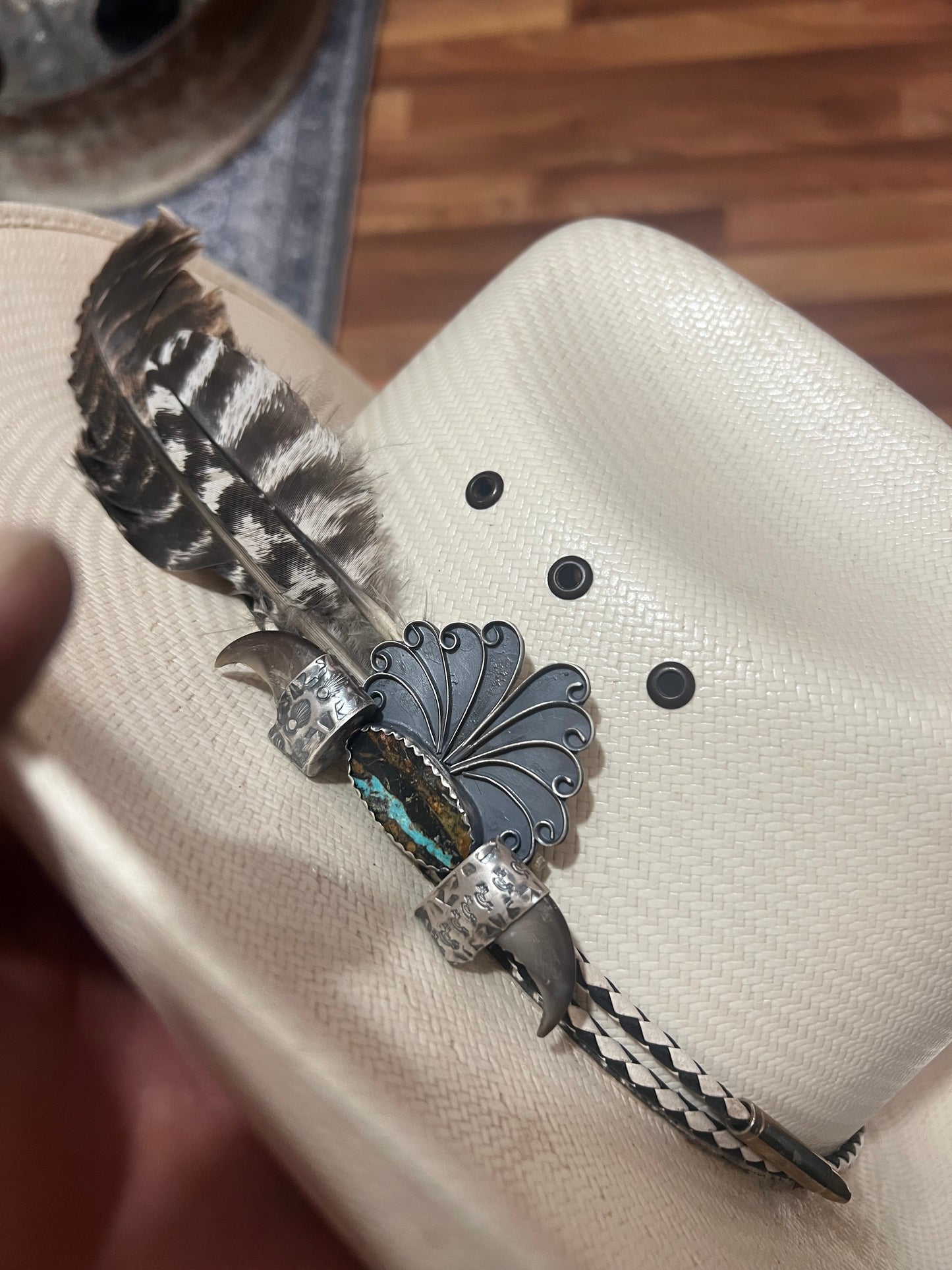 Handmade sterling silver, blackjack turquoise, black bear claw and turkey feather, adjustable hat band