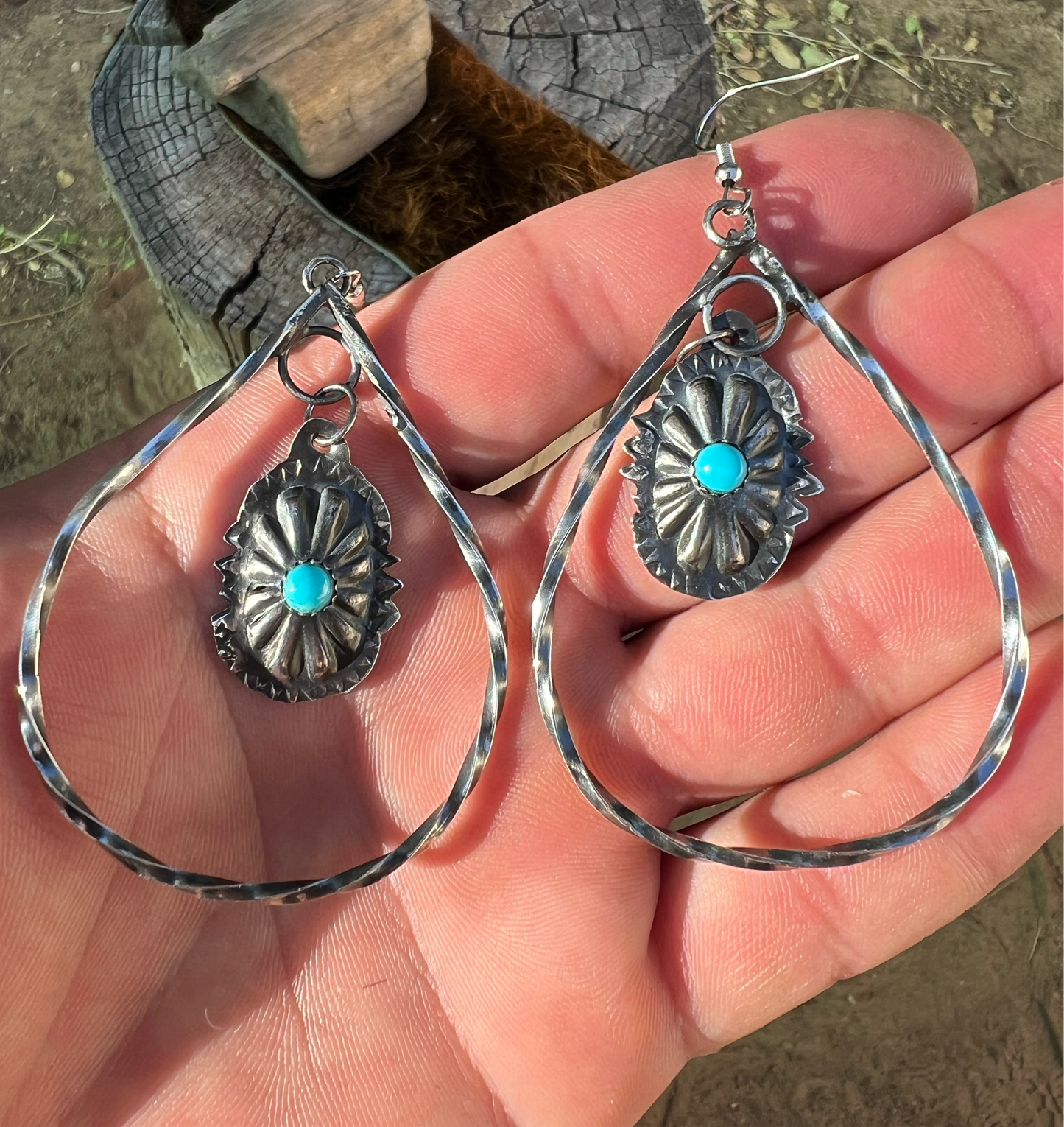 Sterling silver and sleeping beauty turquoise concho earrings.