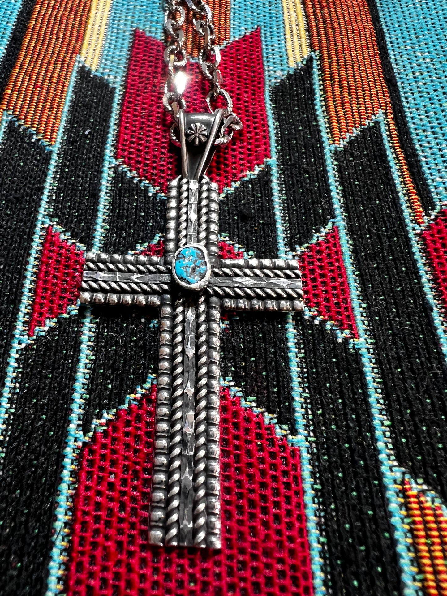 Handmade sterling silver cross with Kingman turquoise. Chain sold separately.