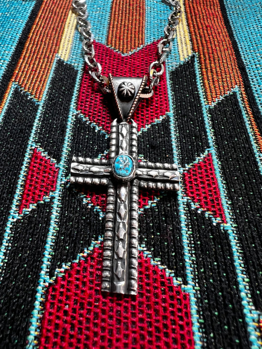 Handmade sterling silver cross with Kingman turquoise. Chain sold separately.