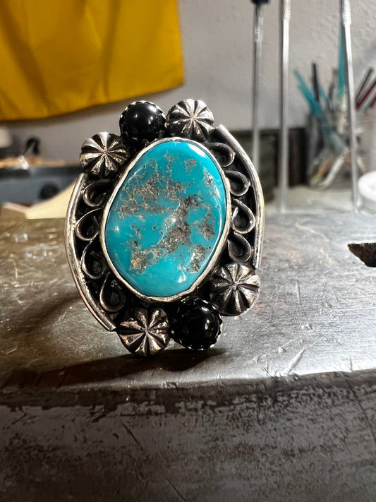 Handmade sterling silver and Sonoran turquoise and onyx ring. Size 8