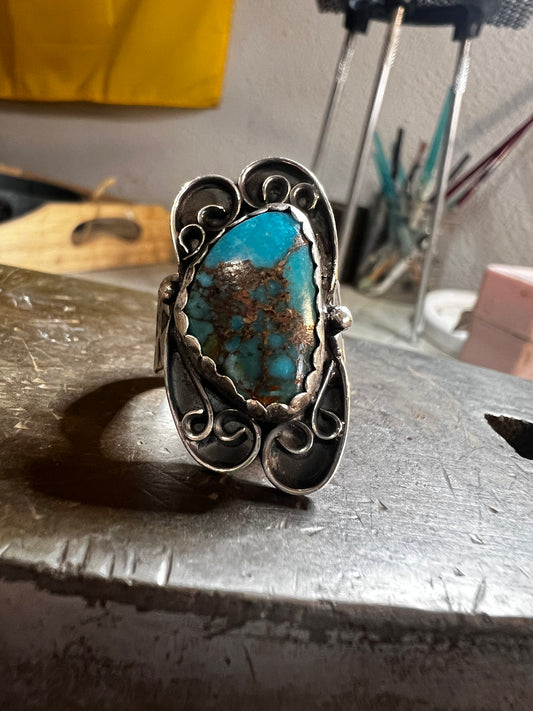 Handmade sterling silver and Morenci turquoise ring. Size 8.