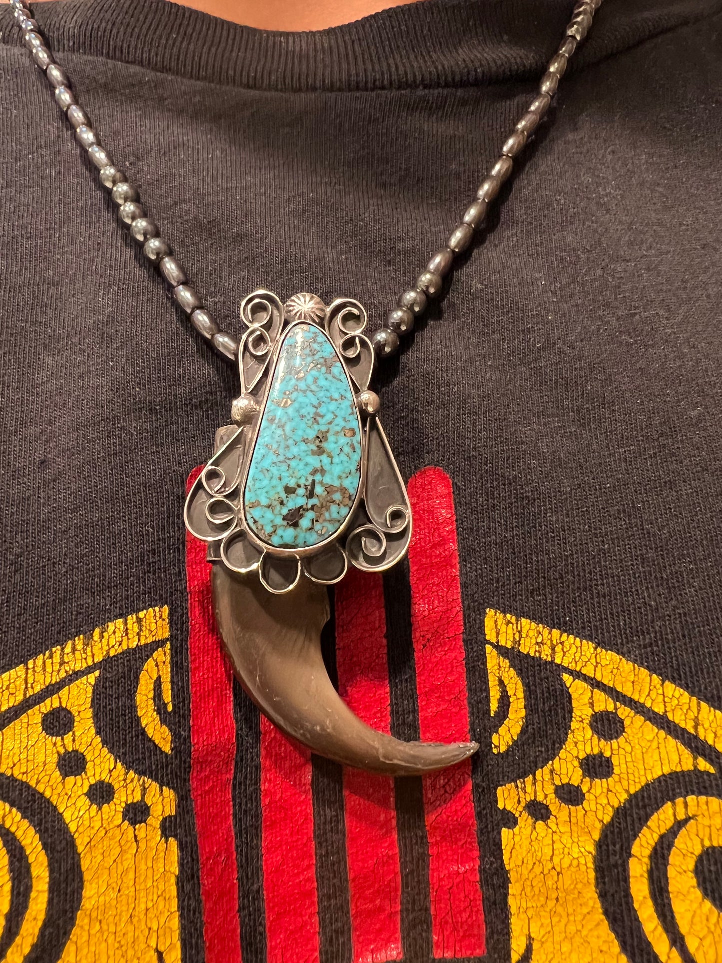 Sterling silver and Ithaca peak turquoise, black bear claw pendant ￼