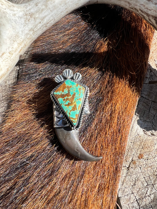 Sterling silver and Tyrone turquoise black bear claw pendant ￼