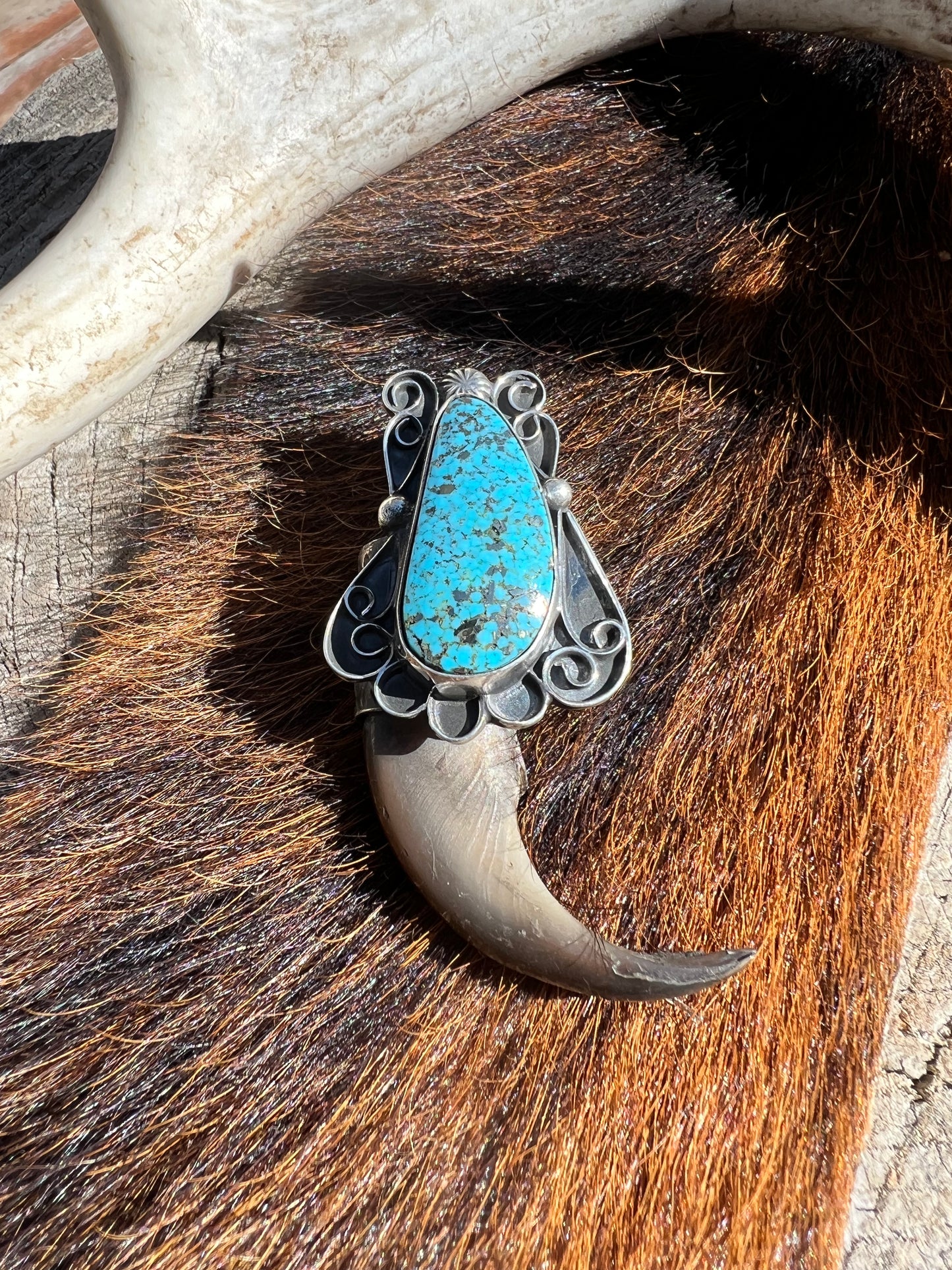 Sterling silver and Ithaca peak turquoise, black bear claw pendant ￼