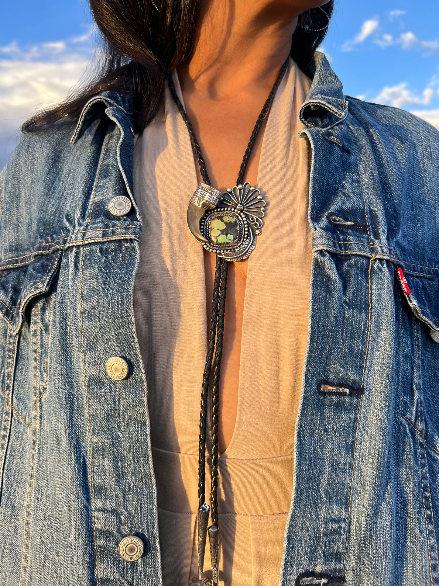 Handmade, black bear claw bolo tie, with sterling silver, and Hubei Turquoise