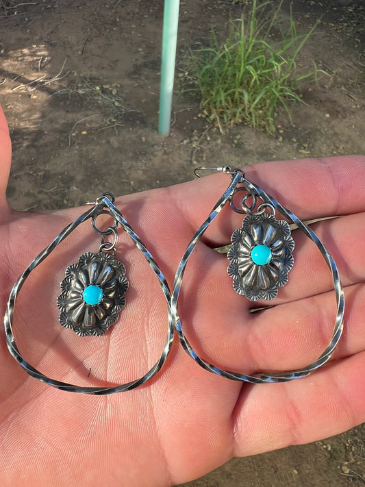 Sterling silver and sleeping beauty turquoise concho earrings.